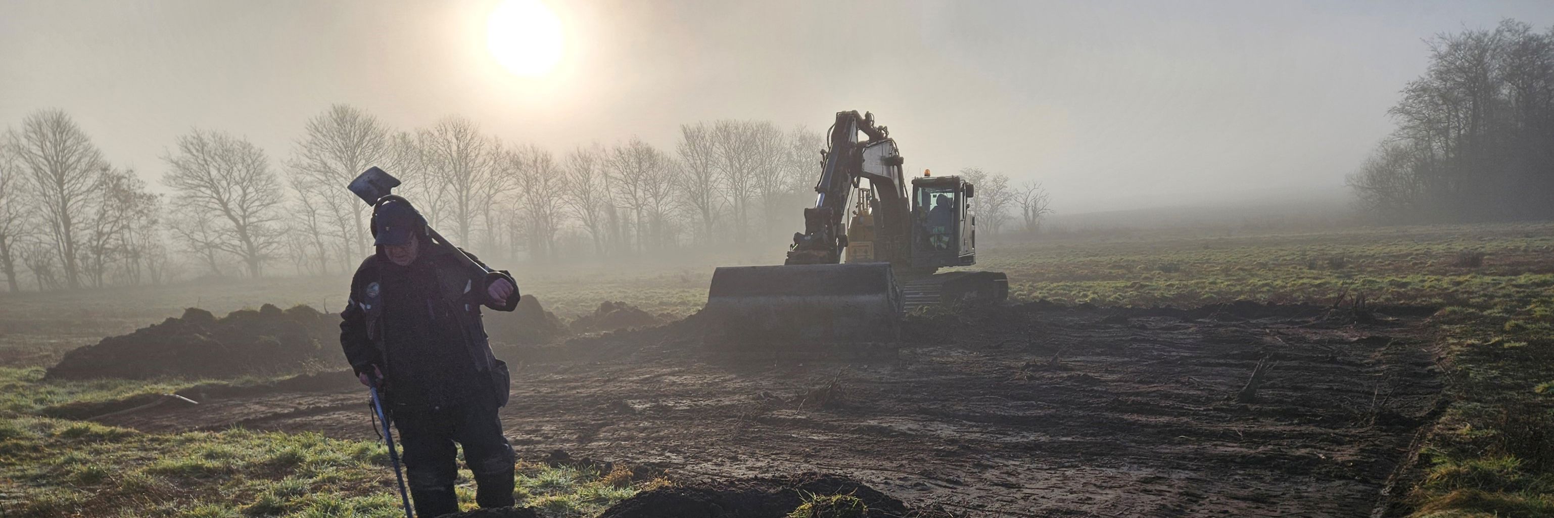 Detektorfører og arkæologisk udgravning