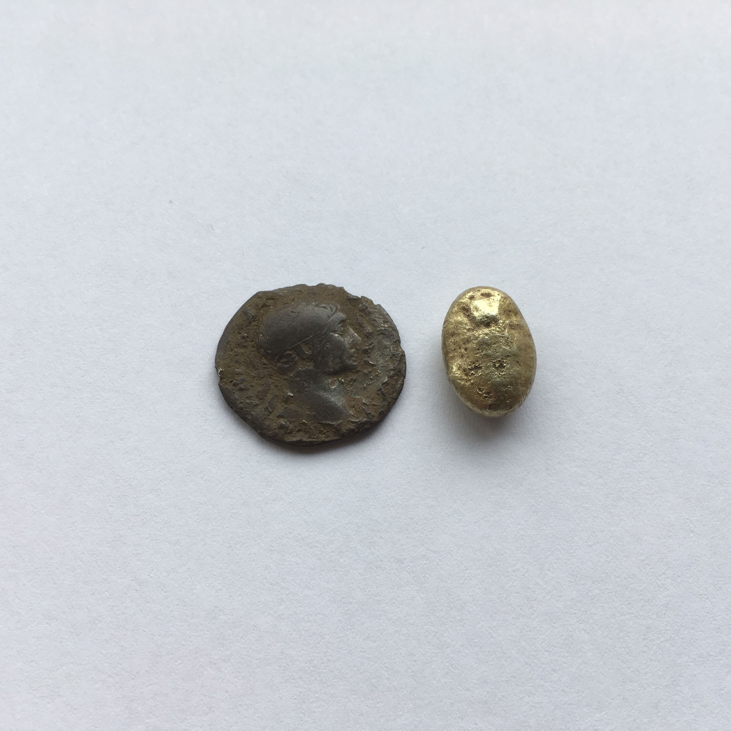 Arkæologisk fund, guldperle og mønt